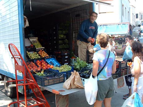 Suzanne buys fruit straight off the truck